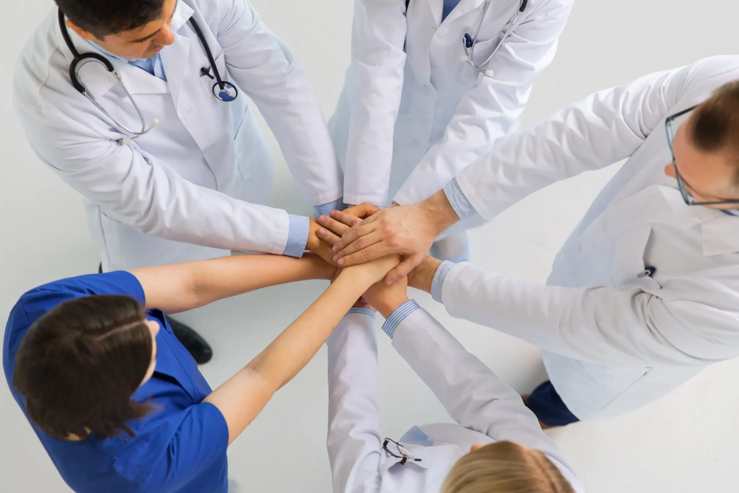 Healthcare professionals collaborating on quality improvement opportunity identification and implementation